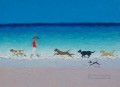 Mädchen mit Hunde am Strand laufen